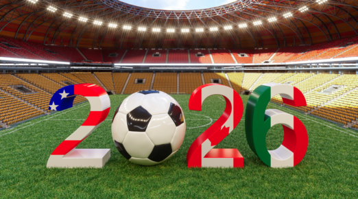 Soccer ball placed between the numbers 2026 on a football field inside a modern stadium, symbolizing the 2026 international tournament
